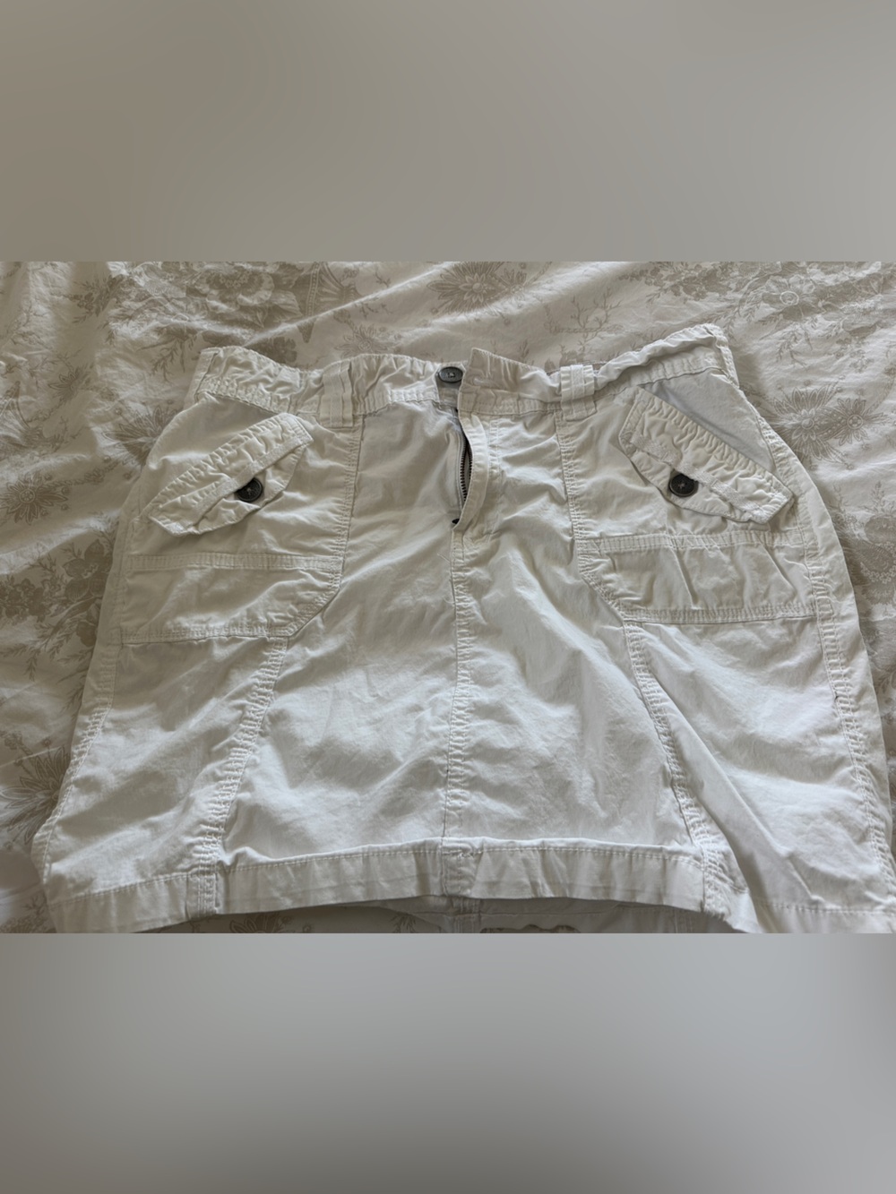 Women’s White Mini Skirt with Buttoned Back Pockets